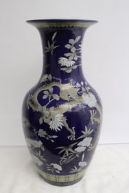 blue background famille rose porcelain vase