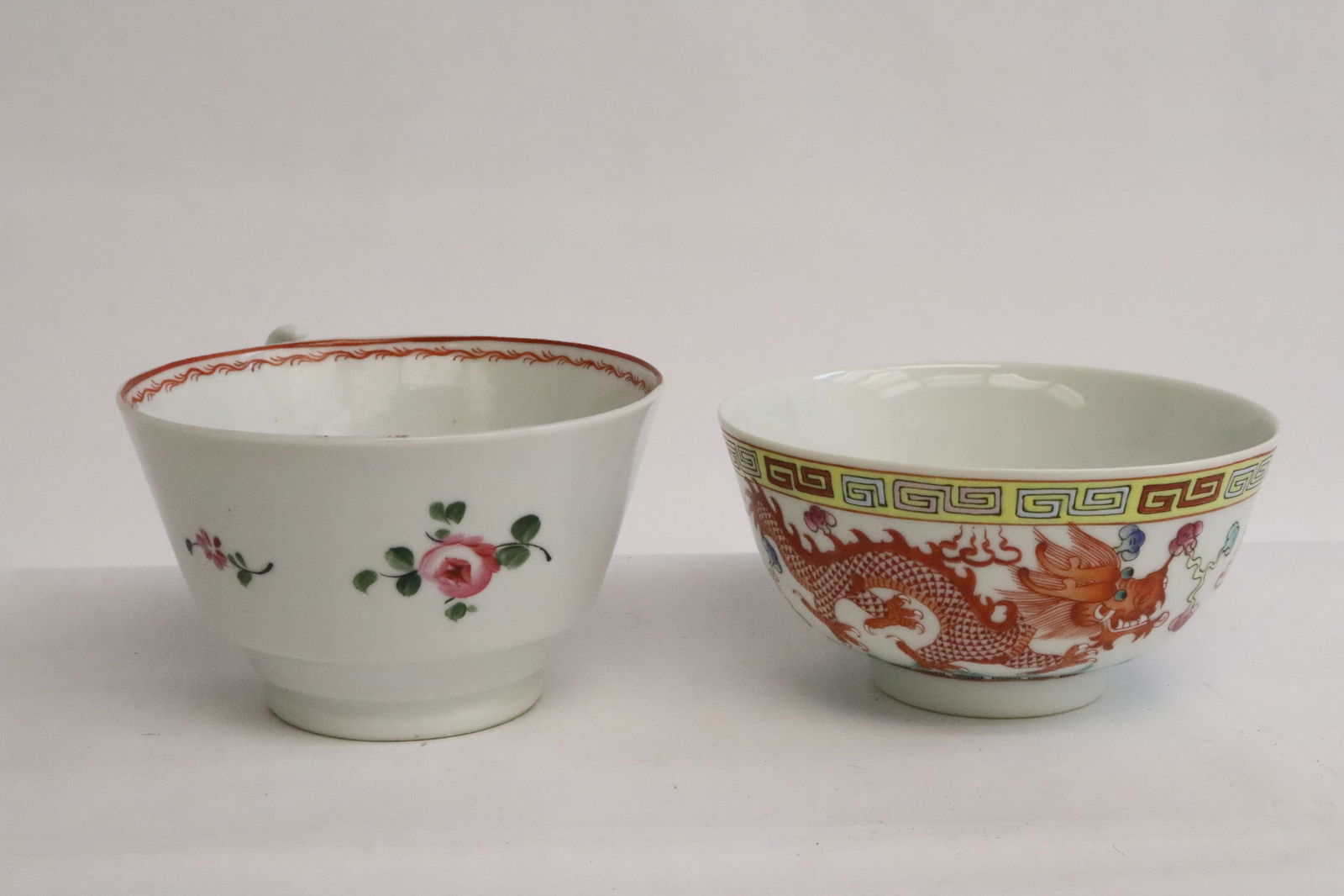2 famille rose porcelain pieces: 2 pieces; vintage Chinese export famille rose handled tea cup (2.8"x5.2"x4.5"), and a famille rose porcelain bowl (2.4"x4.6"dia)
