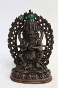 A copper sculpture of deity