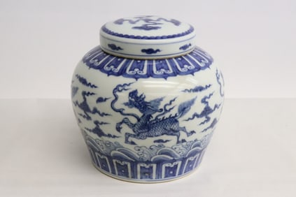 A blue and white porcelain covered jar