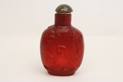 A red on red overlay Peking glass snuff bottle
