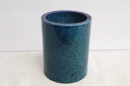 A blue on blue porcelain brush holder