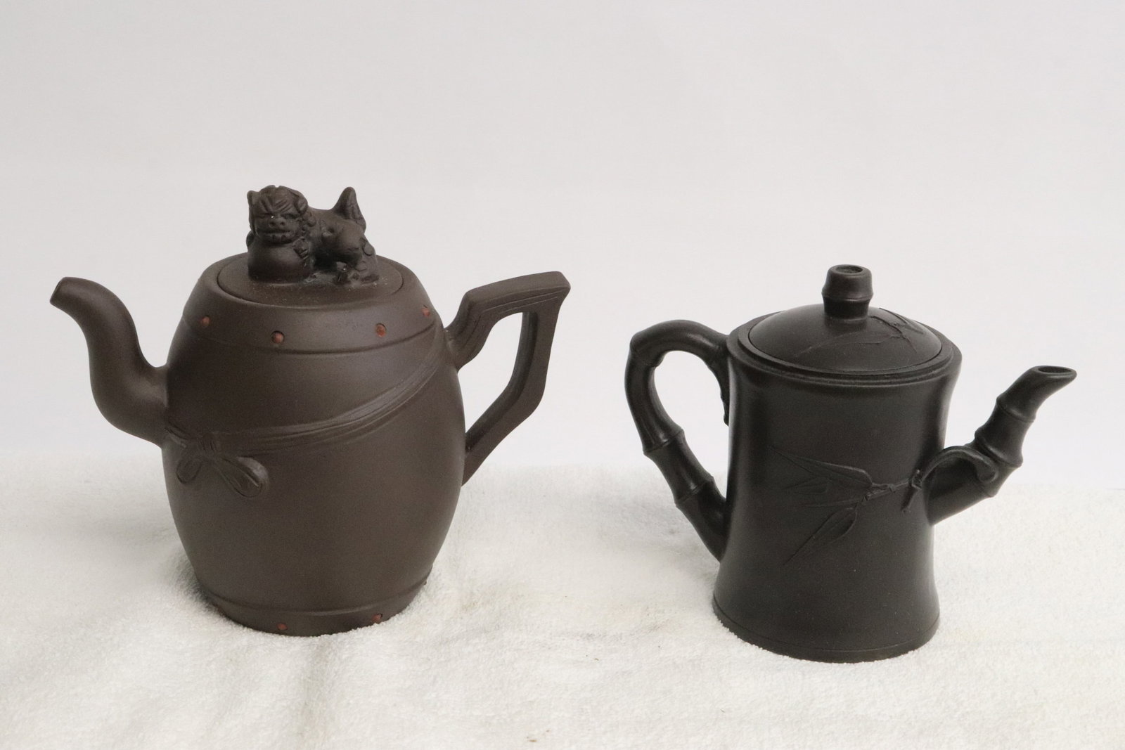 2 Yixing teapots: 2 Yixing teapots, 4.65"x5.6"x2.85", 5.5"x6.25"x3.75"