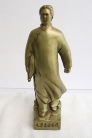A brass sculpture of Chairman Mao
