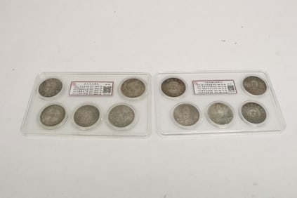 2 panels of reproduction coins