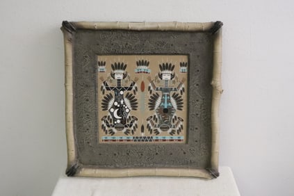 An Indian sand painting, artist info on back