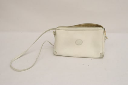 A white lady's shoulder bag