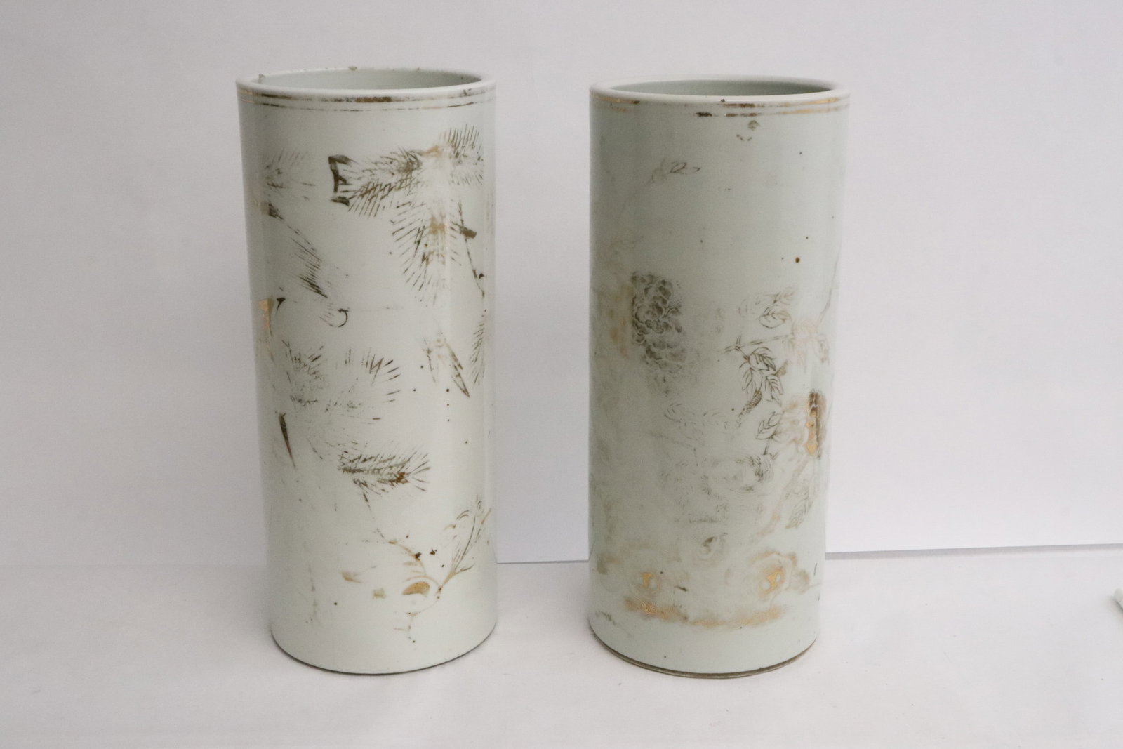 Pair Chinese 19th/20th c. porcelain hat vases: Pair Chinese 19th/20th century gold on white porcelain hat vases, gold worns, 11.3"x4.75"dia ea
