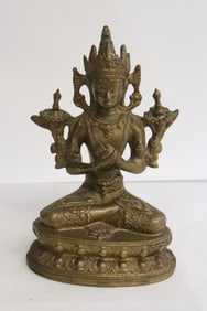 A brass sculpture of deity