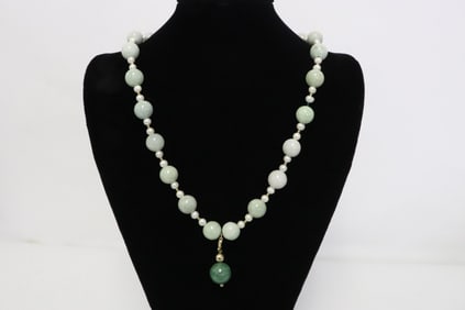 A jadeite and cultured pearl necklace
