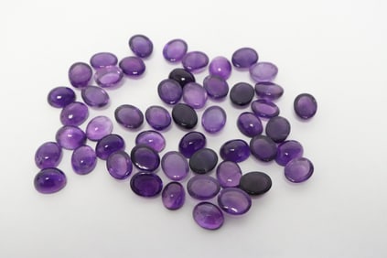 Lot of amethyst cabochon stones