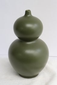 A tea dust style glazed gourd shape vase