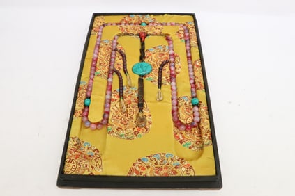 A long necklace in presentation box