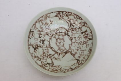 A red and white porcelain bowl