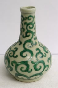 Chinese green on yellow porcelain vase