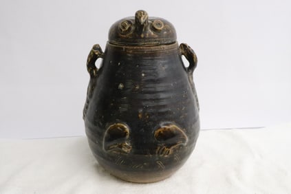 Large brown glazed oil jar