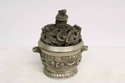 A white bronze covered censer