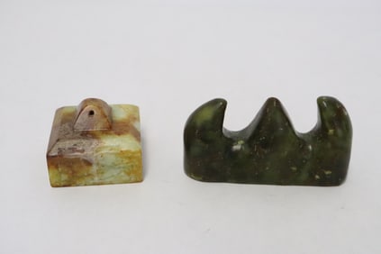 2 stone carved pieces