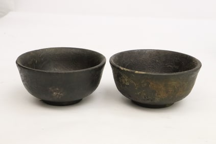 2 stone carved bowls