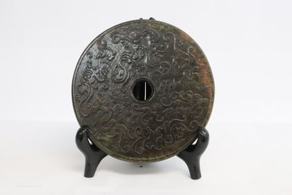 A stone carved disk