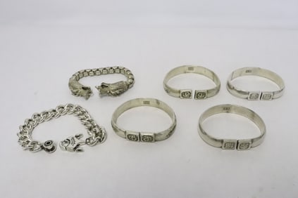 6 white bronze bracelets