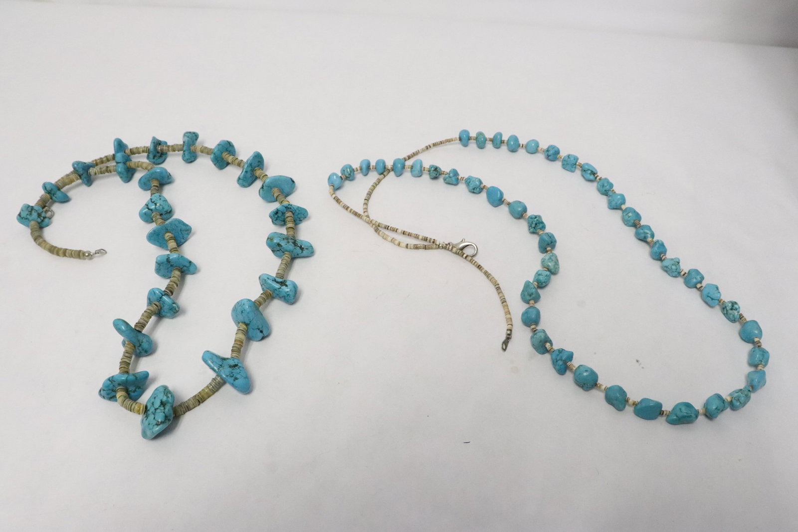 2 turquoise bead necklaces: 2 turquoise bead necklaces 29"L, 37.7"L