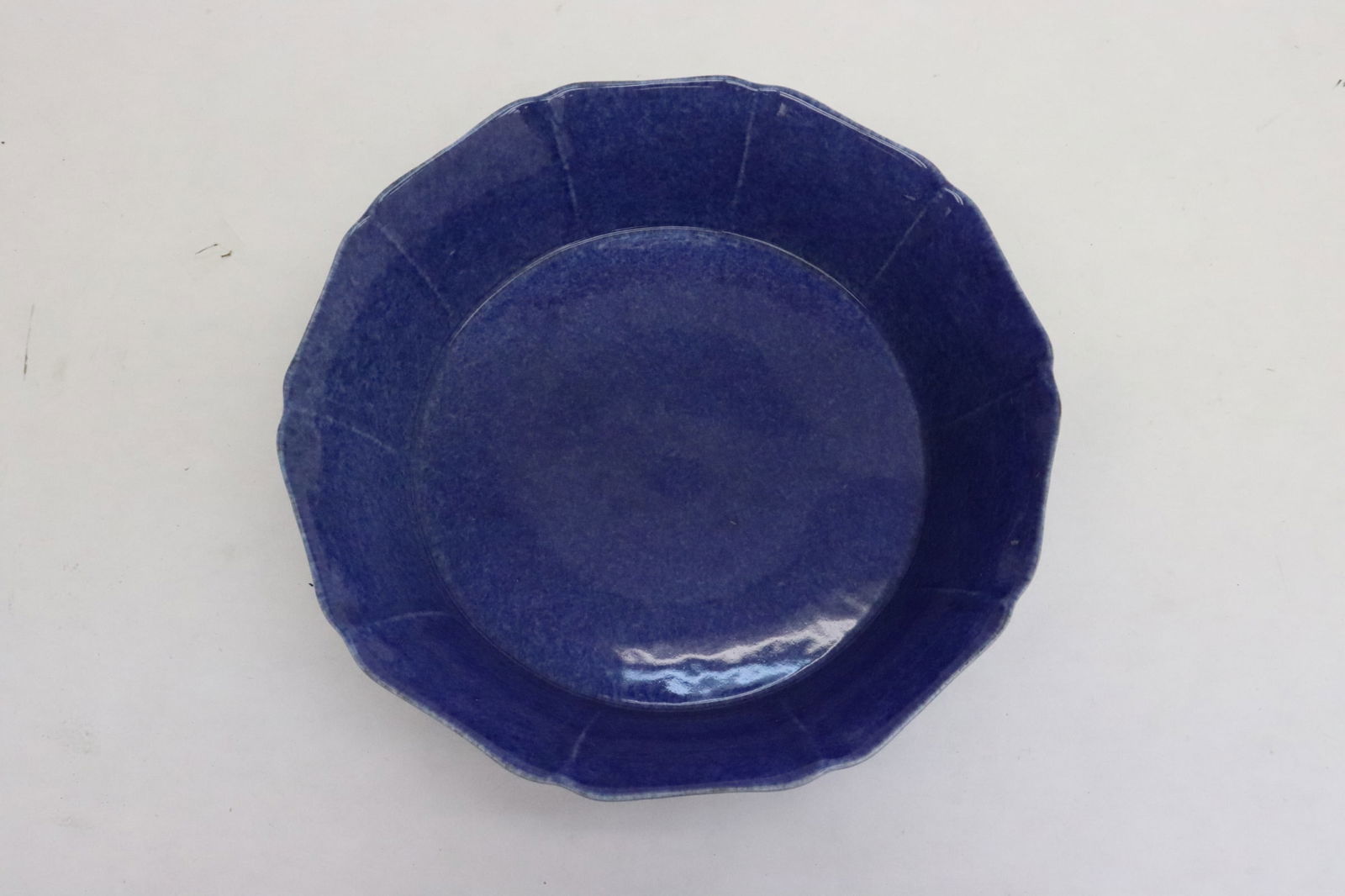 Chinese blue on blue porcelain brush wash: Chinese blue on blue porcelain brush wash, 2.1"x7.65"dia