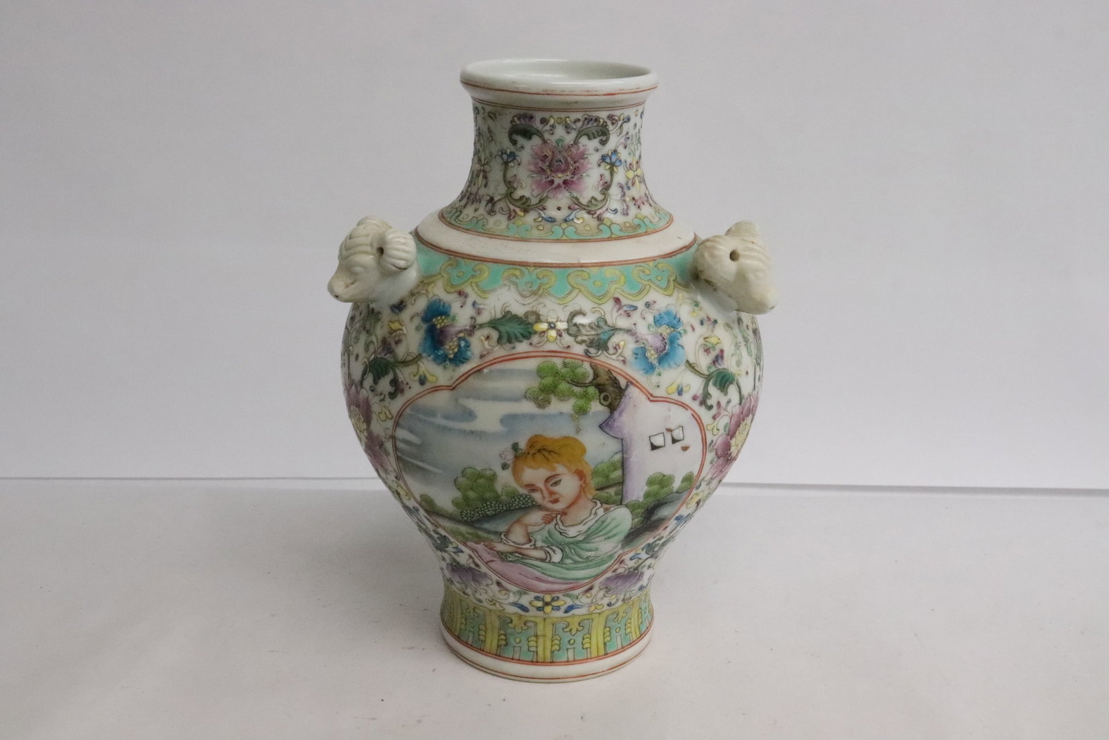 Fine Chinese famille rose porcelain jar: Fine Chinese famille rose porcelain jar, panel with foreigners, with ram motif handles, 7.7"x5.7"x5.7"