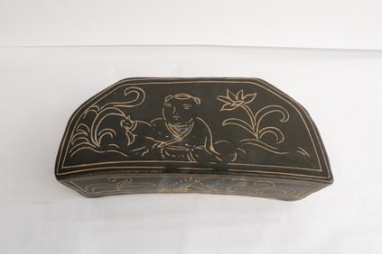 Brown glazed earthenware pillow