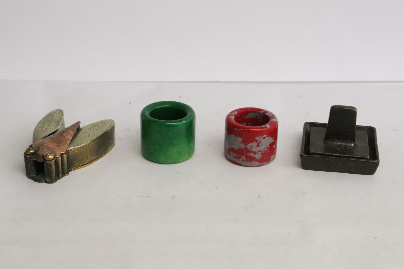 2 archer's rings, a bronze seal, & a mixed metal box (1 of 7)