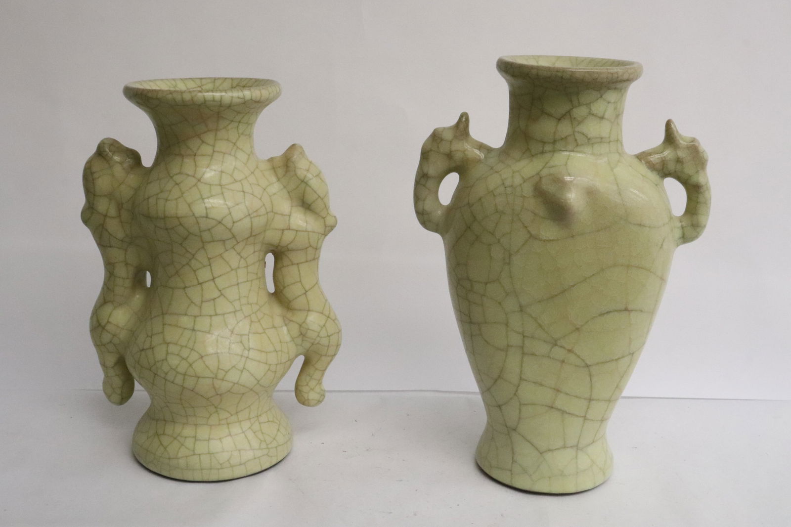 2 crackleware handled vases: 2 crackleware handled vases, 9.5"x6.5"x4.4", 10.2"x7"x4.35"
