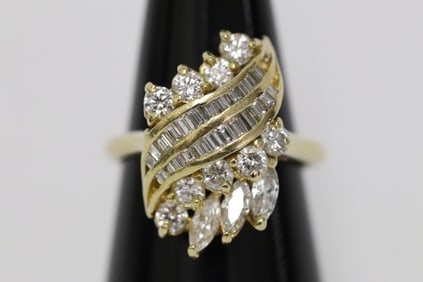 An 18k Y/G diamond ring