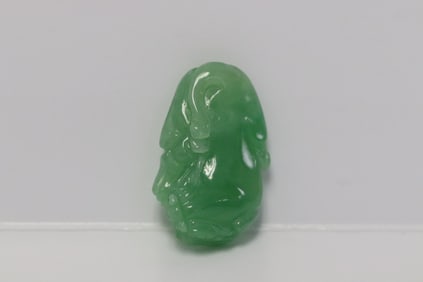 A jadeite carving with GIA certificate