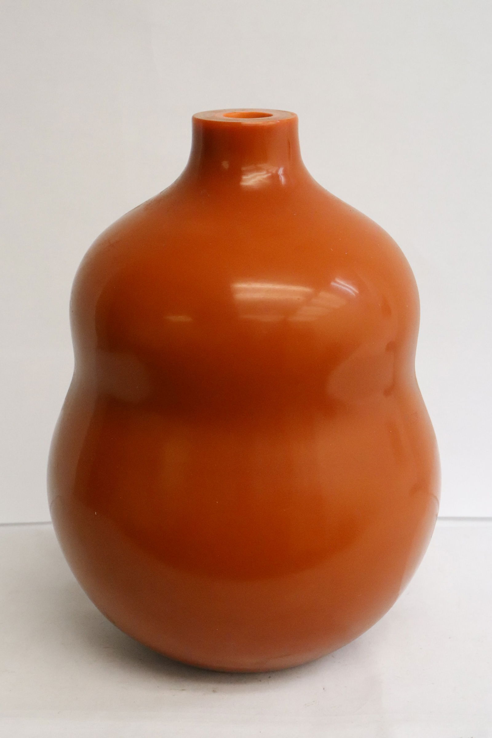 A gourd shaped Peking glass vase by Robert Kuo: A gourd shaped Peking glass vase by Robert Kuo, 10.3"x7.65"dia