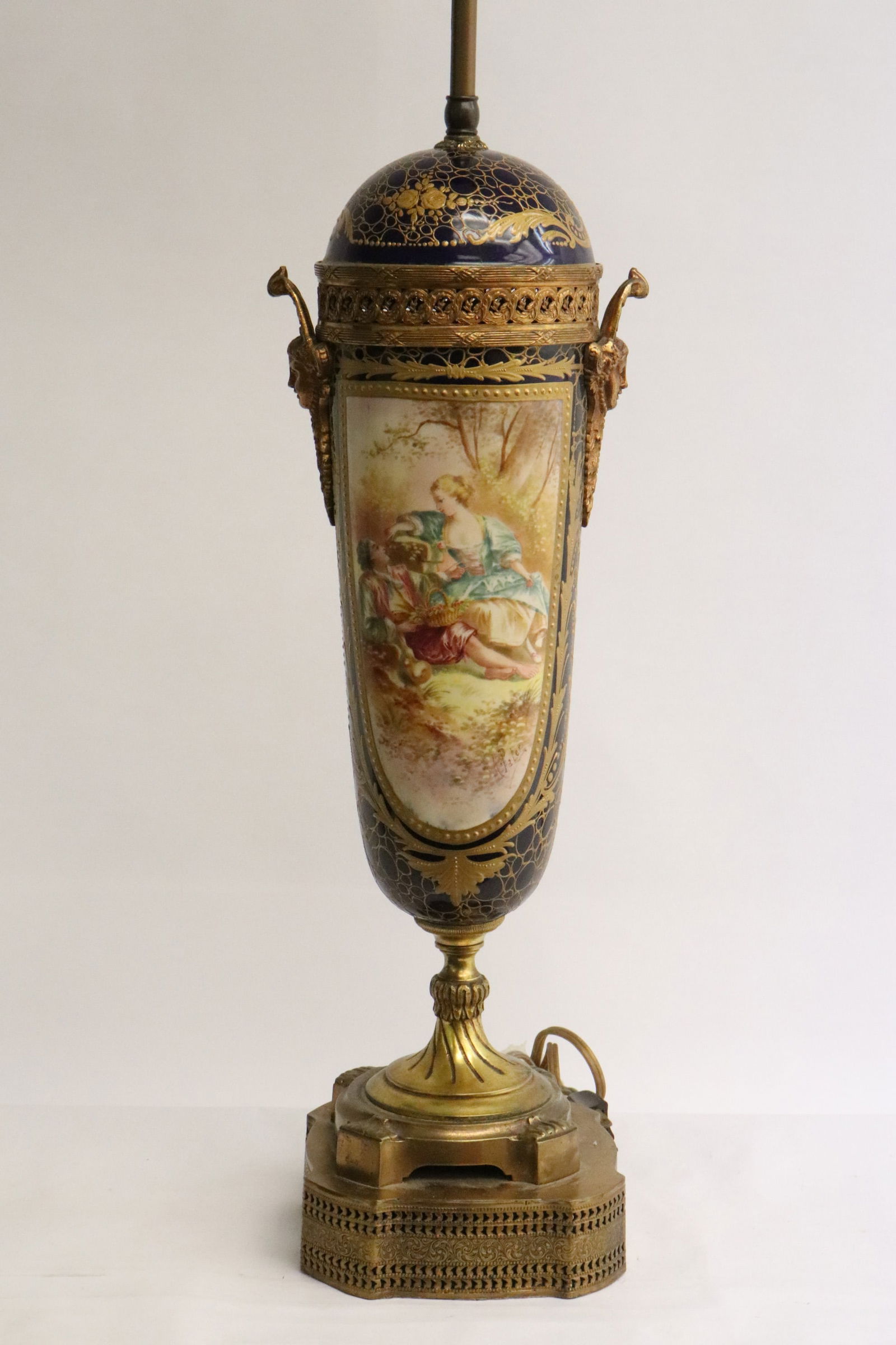Antique Sevres porcelain vase, made as lamp: Antique Sevres porcelain vase with gilt metal mount (17.15"x5.8"x4.35"), made as lamp (28.35"H)