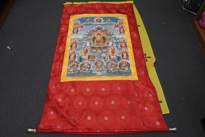 A Tibetan early 20th c, hand painted thangka