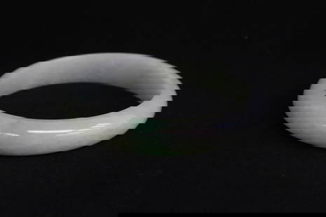 Chinese natural color jadeite bangle w/ GIA report: Chinese natural color light apple green jadeite bangle measures approx. 70.17x11.71mm with GIA report