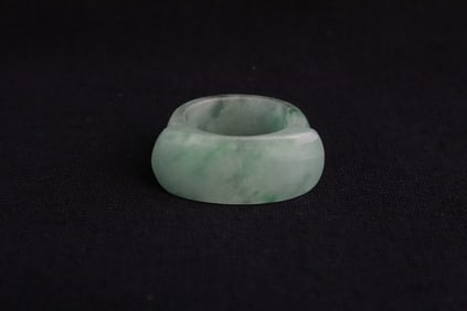 A light apple green jadeite saddle ring