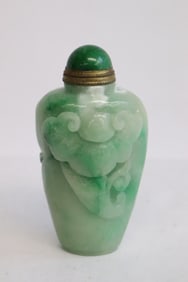 Fine apple green jadeite carved snuff bottle