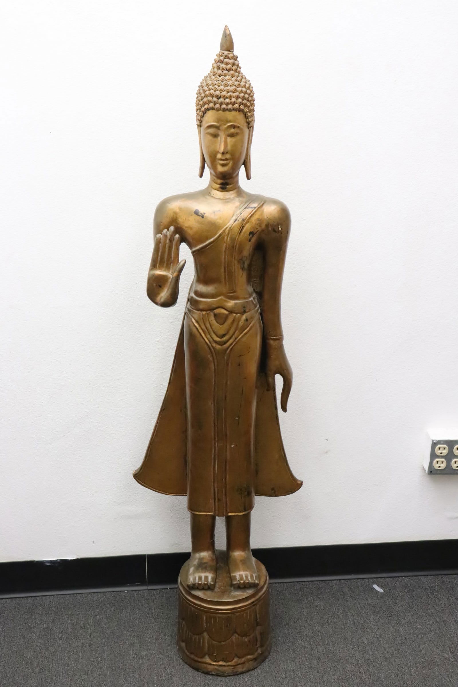 A South Asian life size gilt wood sculpture (1 of 11)