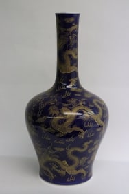 Chinese gold on blue background porcelain vase