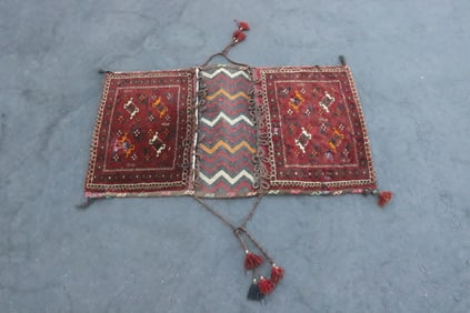 Vintage Persian saddle rug
