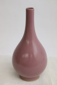 A purple glazed porcelain vase