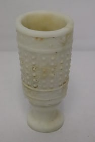 A stone carved wine goblet