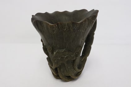 A horn style libation cup