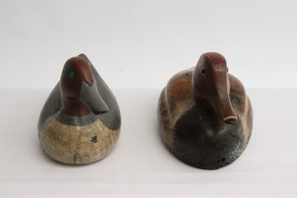 2 wood carved decoys; one signed