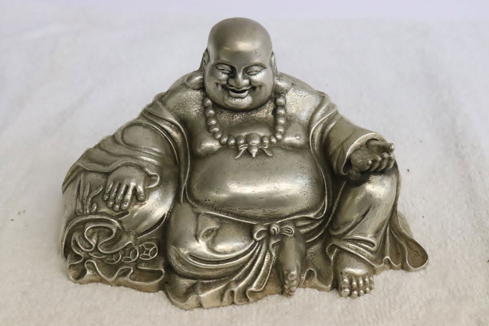 A white bronze sculpture of deity: A white bronze sculpture of deity, 3.35"H