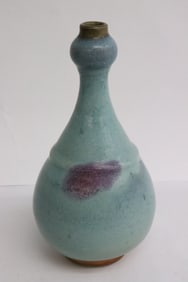 A Jun yao style porcelain garlic top vase
