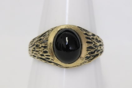 14K Y/G ring, center a black onyx