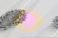 14K Y/G ring, center a pink stone
